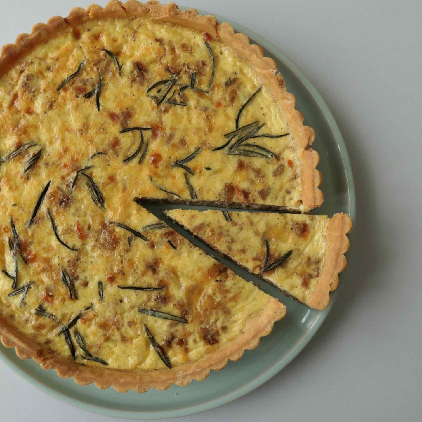 Top view of the 24cm salmon and caramelised onion quiche.